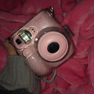 Light pink pastel 7s instax camera.